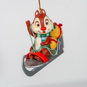 Disney Grolier Christmas holiday tree ornament  Dale sledding with nuts. 